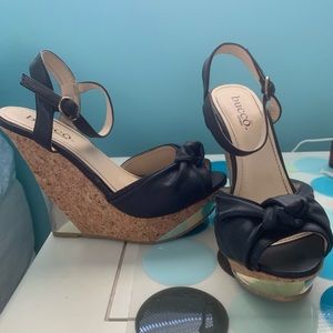 Black, gold, and cork wedge Bucco size 7